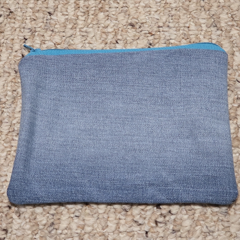 Stylish Blue Denim Pouch With Blue Zipper And Lining